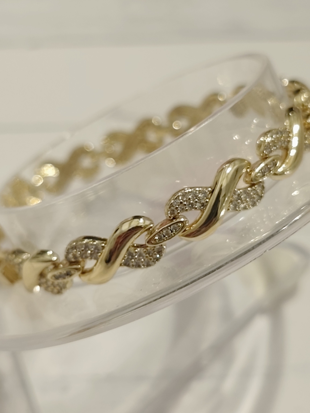 The surface is plated with a thin layer of real gold 14k.